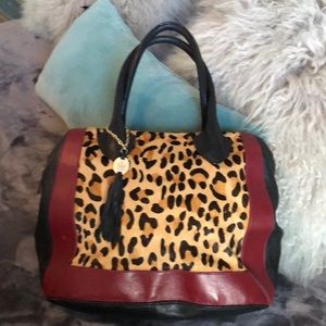 Leather and hair satchel. No imperfections!!